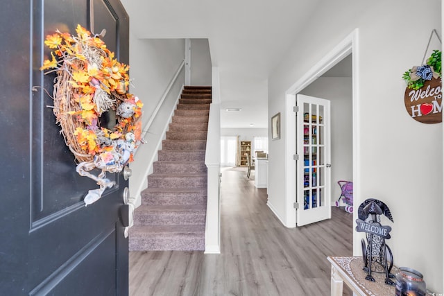 entryway with light wood-type flooring