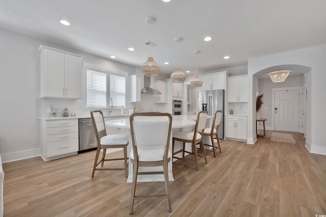 dining room featuring light hardwood / wood-style floors