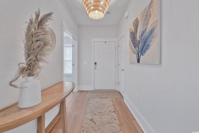 entrance foyer featuring hardwood / wood-style flooring