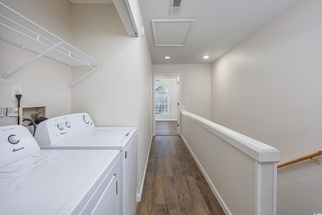 laundry room featuring dark wood-type flooring and washing machine and clothes dryer