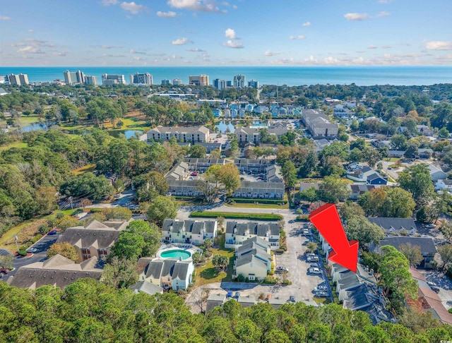 birds eye view of property featuring a water view