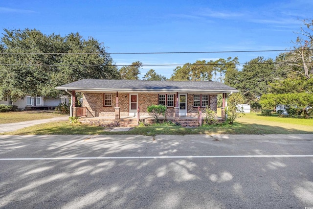 view of front of property featuring covered porch