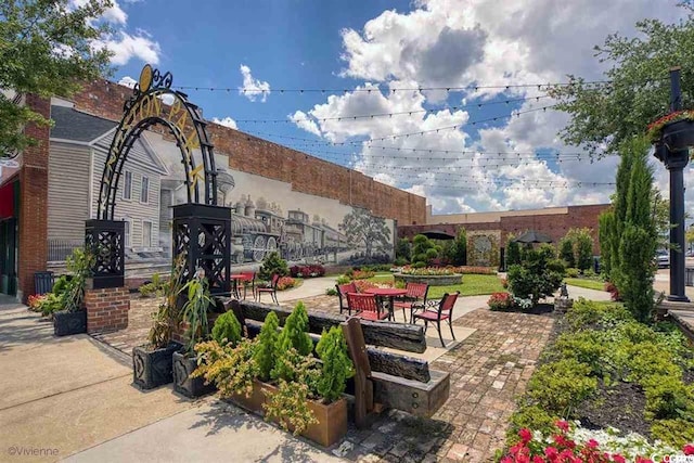 view of property's community with a patio