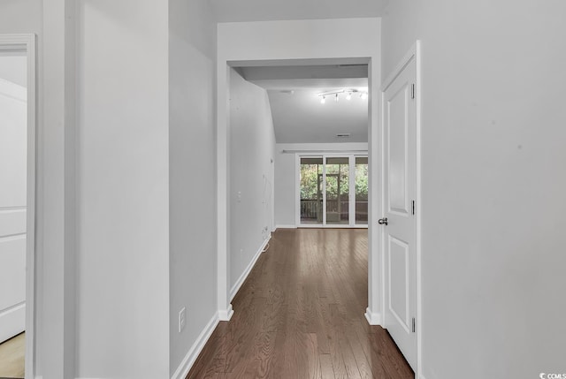 hallway featuring dark hardwood / wood-style floors