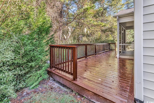 deck with a sunroom