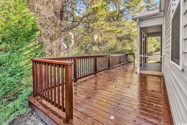 deck featuring a sunroom