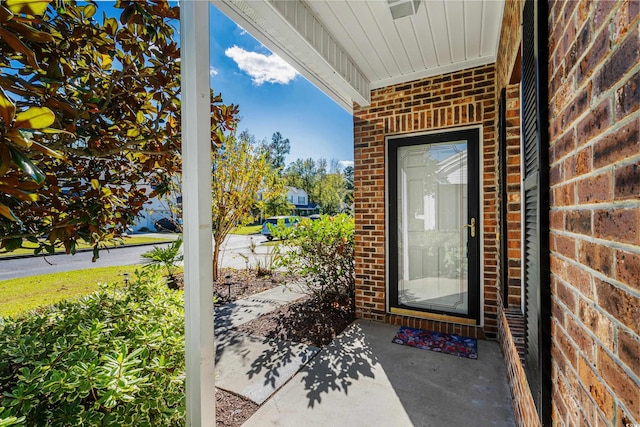 entrance to property with a porch