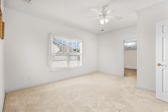 493 Shellbank Dr Unit 2-B, Longs, SC 29568 - spare room featuring ornamental molding, carpet floors, baseboards, and ceiling fan