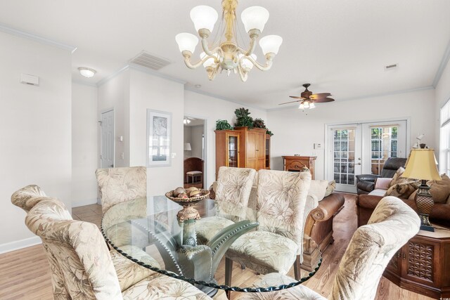 493 Shellbank Dr Unit 2-B, Longs, SC 29568 - dining space featuring french doors, a chandelier, ornamental molding, a ceiling fan, and baseboards