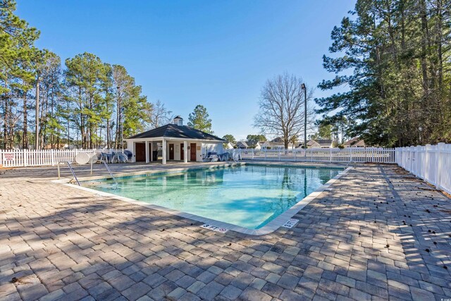 493 Shellbank Dr Unit 2-B, Longs, SC 29568 - community pool with a patio area
