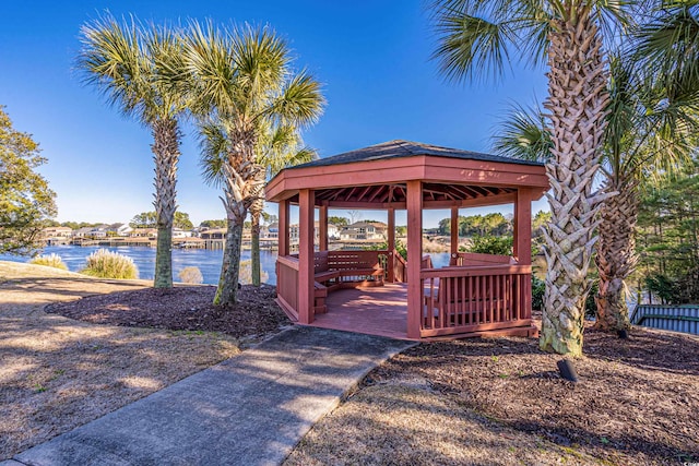 dock area featuring a gazebo and a water view