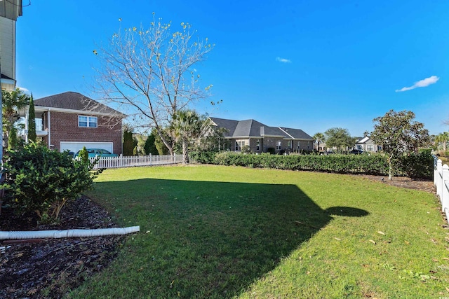 view of yard with a garage