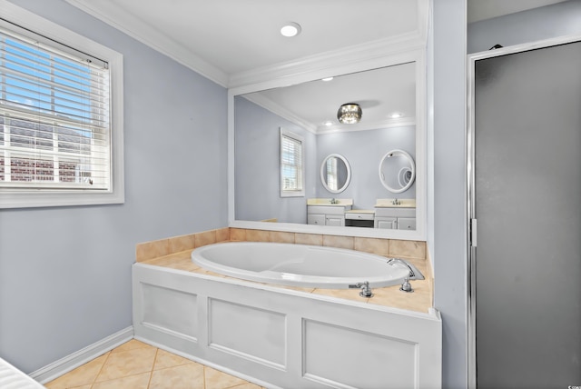 bathroom featuring tile patterned floors, a bath, a healthy amount of sunlight, and ornamental molding