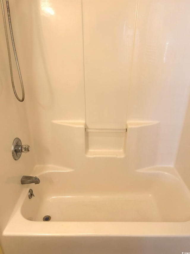 bathroom featuring bathing tub / shower combination