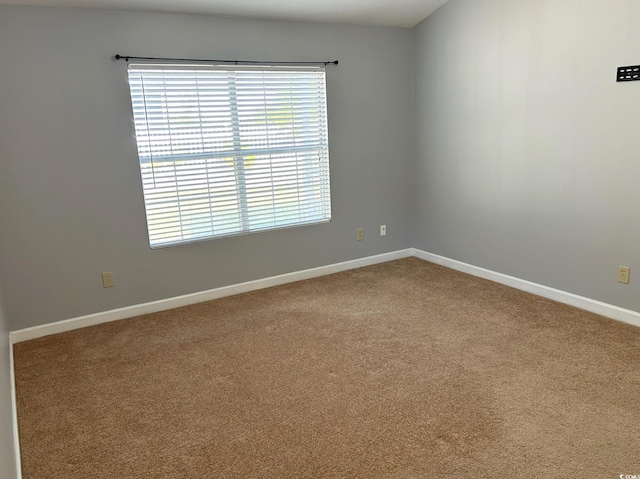 empty room with carpet flooring