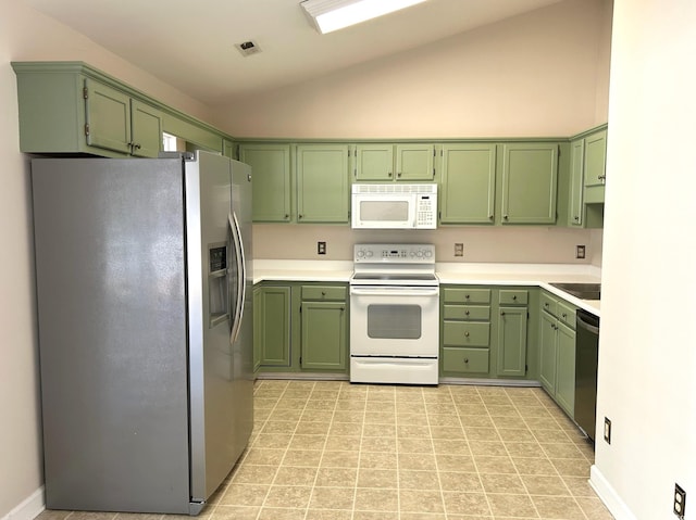 kitchen with lofted ceiling, stainless steel appliances, and green cabinetry