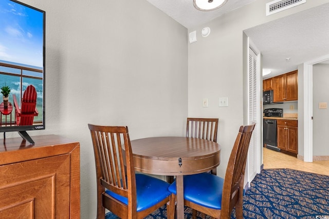 5200 N Ocean Blvd Unit 1231, Myrtle Beach, SC 29577 - dining area featuring light tile patterned floors