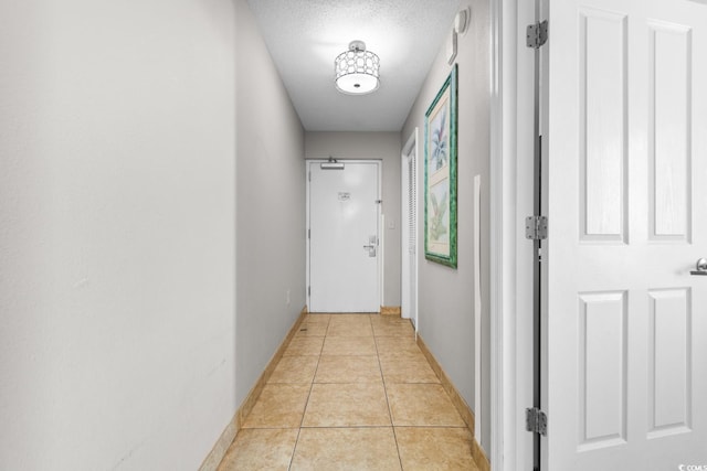 5200 N Ocean Blvd Unit 1231, Myrtle Beach, SC 29577 - hallway with baseboards and light tile patterned floors