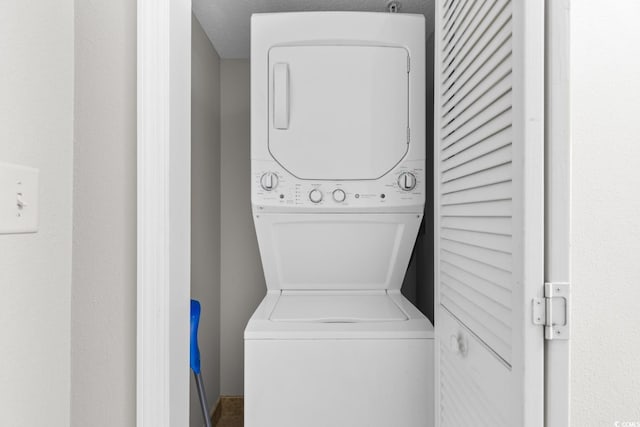 5200 N Ocean Blvd Unit 1231, Myrtle Beach, SC 29577 - washroom with stacked washer / dryer