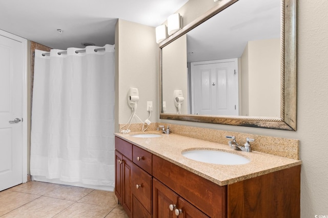 5200 N Ocean Blvd Unit 1231, Myrtle Beach, SC 29577 - full bath with double vanity, tile patterned floors, and a shower with shower curtain