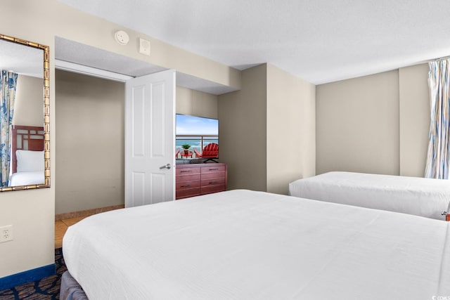 5200 N Ocean Blvd Unit 1231, Myrtle Beach, SC 29577 - bedroom with baseboards