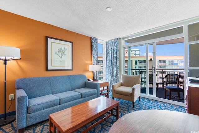 5200 N Ocean Blvd Unit 1231, Myrtle Beach, SC 29577 - living room featuring floor to ceiling windows and a textured ceiling