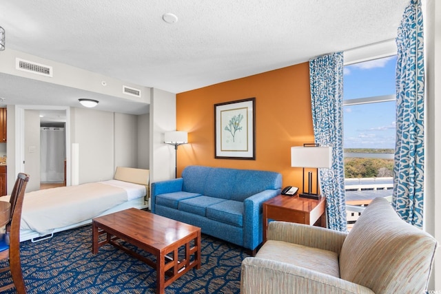 5200 N Ocean Blvd Unit 1231, Myrtle Beach, SC 29577 - living area with a textured ceiling