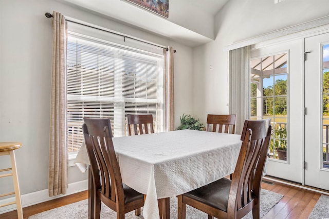 2580 Ash Little River Rd, Ash, NC 28420 - dining area with hardwood / wood-style floors and baseboards