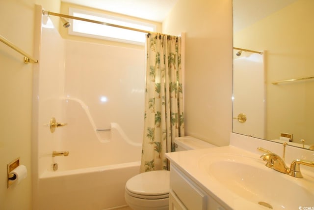 full bathroom with vanity, toilet, and shower / tub combo with curtain