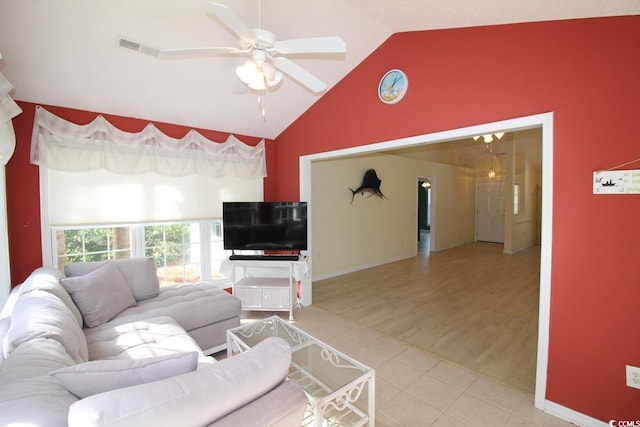 living room featuring hardwood / wood-style flooring, ceiling fan, and high vaulted ceiling