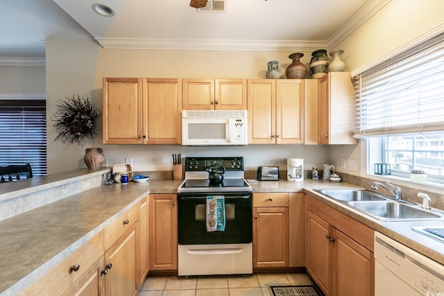 kitchen with white appliances, sink, light tile patterned floors, ornamental molding, and light brown cabinetry