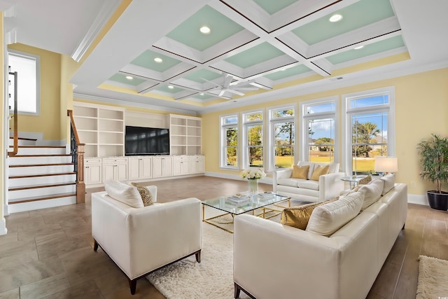 living room with beamed ceiling, ornamental molding, and coffered ceiling