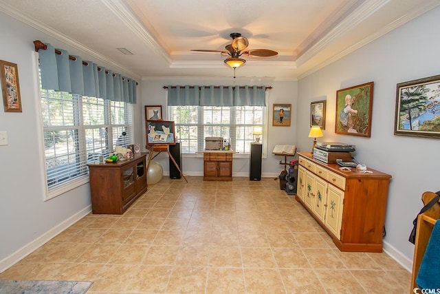 tiled home office with a raised ceiling, ceiling fan, and ornamental molding