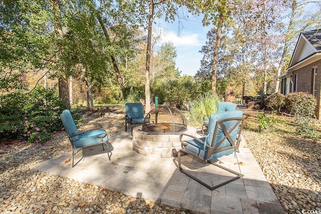 view of patio featuring a fire pit