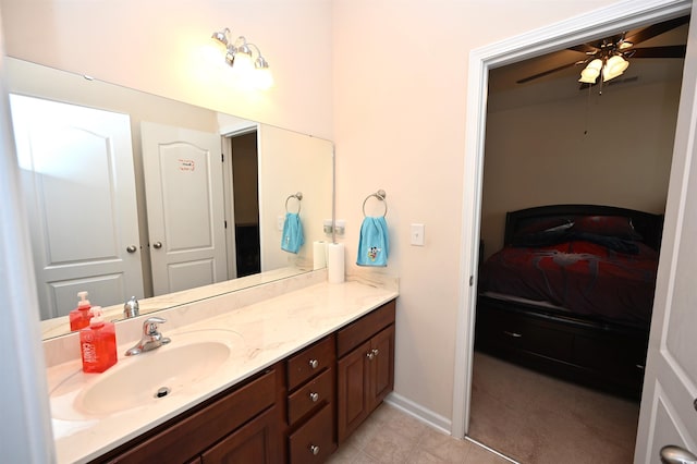 bathroom featuring ceiling fan and vanity