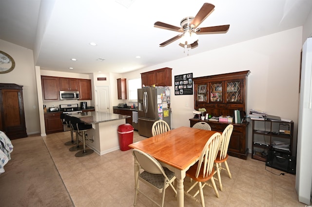 dining room featuring ceiling fan