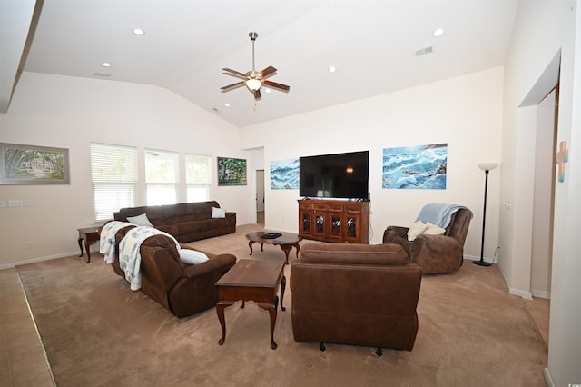 carpeted living room featuring ceiling fan and high vaulted ceiling