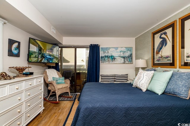 bedroom with light wood-type flooring