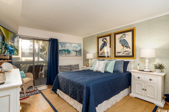 bedroom with light wood-type flooring