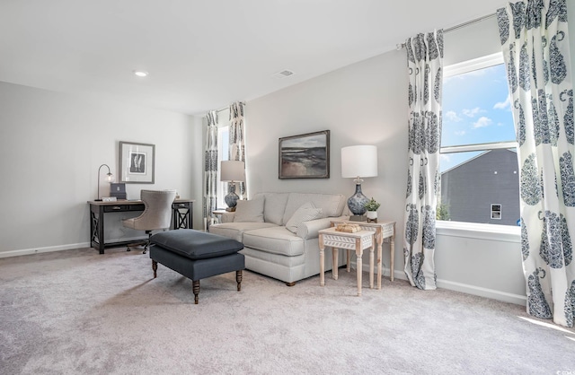 living room with light carpet