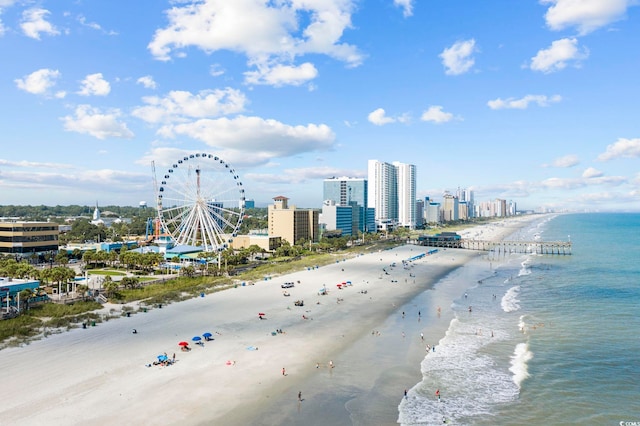 aerial view featuring a water view and a view of the beach