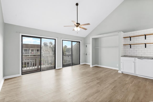 unfurnished living room with ceiling fan, light hardwood / wood-style floors, and high vaulted ceiling