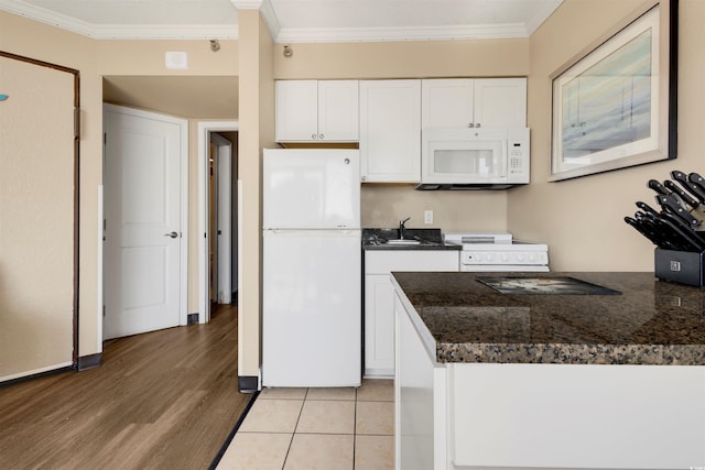 kitchen featuring white cabinets, white appliances, crown molding, and light hardwood / wood-style flooring