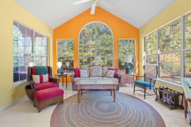 sunroom with plenty of natural light, ceiling fan, and lofted ceiling