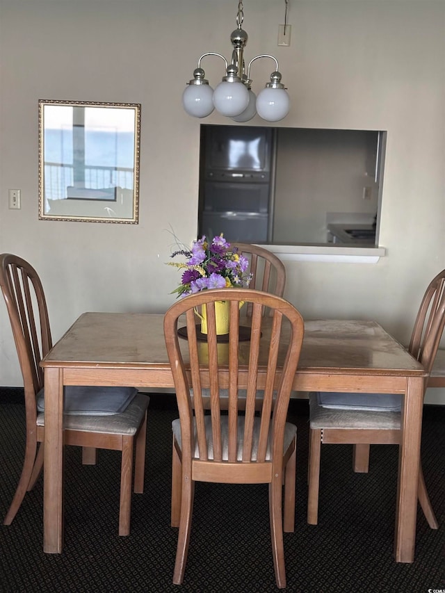 dining room with an inviting chandelier