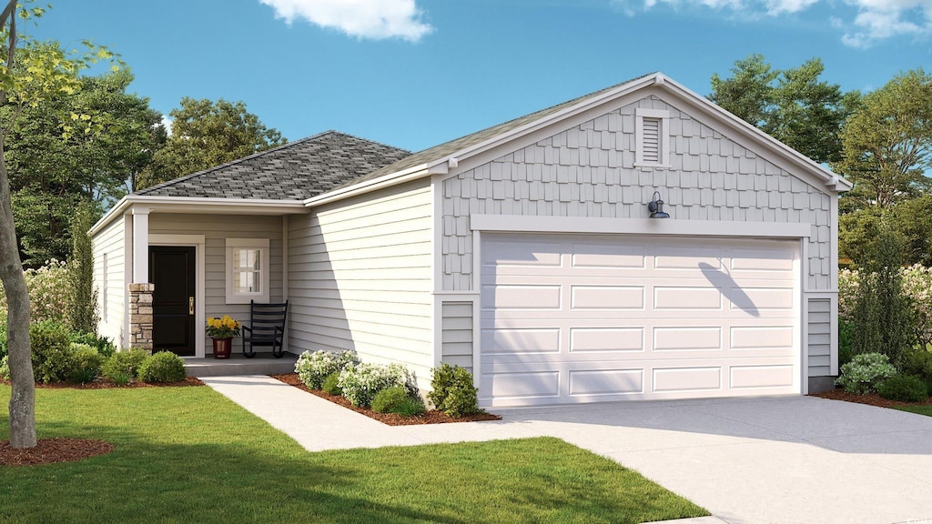 ranch-style house featuring a front yard and a garage