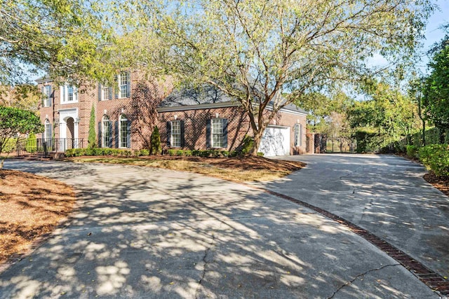 3754 Annandale Dr, Myrtle Beach, SC 29577 - view of front of property featuring driveway, brick siding, and a garage