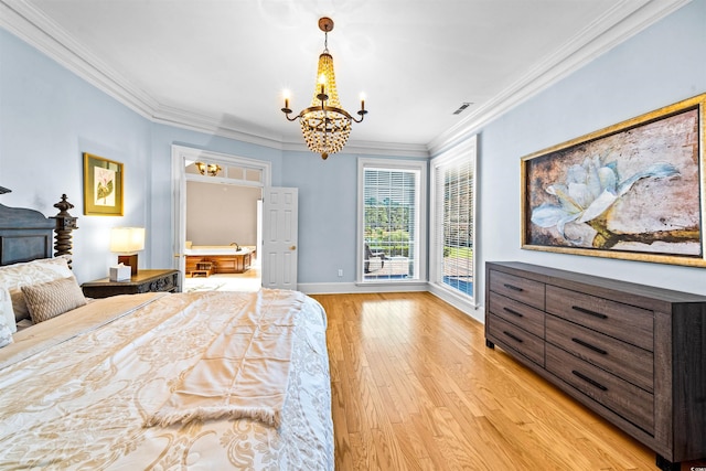 3754 Annandale Dr, Myrtle Beach, SC 29577 - bedroom featuring a chandelier, light wood-type flooring, and ornamental molding