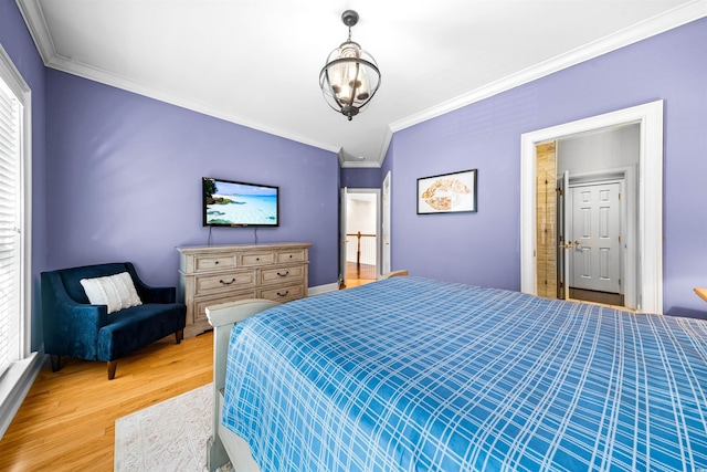 3754 Annandale Dr, Myrtle Beach, SC 29577 - bedroom featuring crown molding, light wood-style flooring, and a chandelier