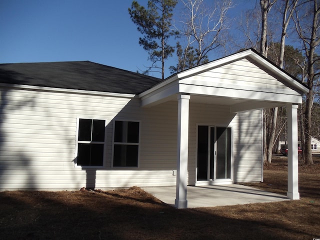 view of home's exterior with a patio area